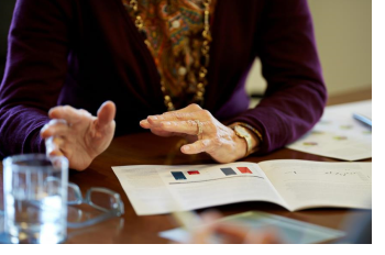 financial advisors hands at conference table